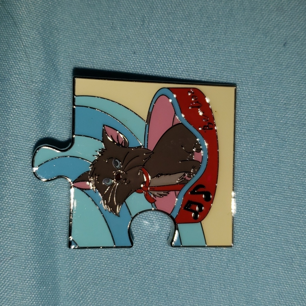 Berlios from the Boxlunch Loungefly Cat Puzzle Pin Set